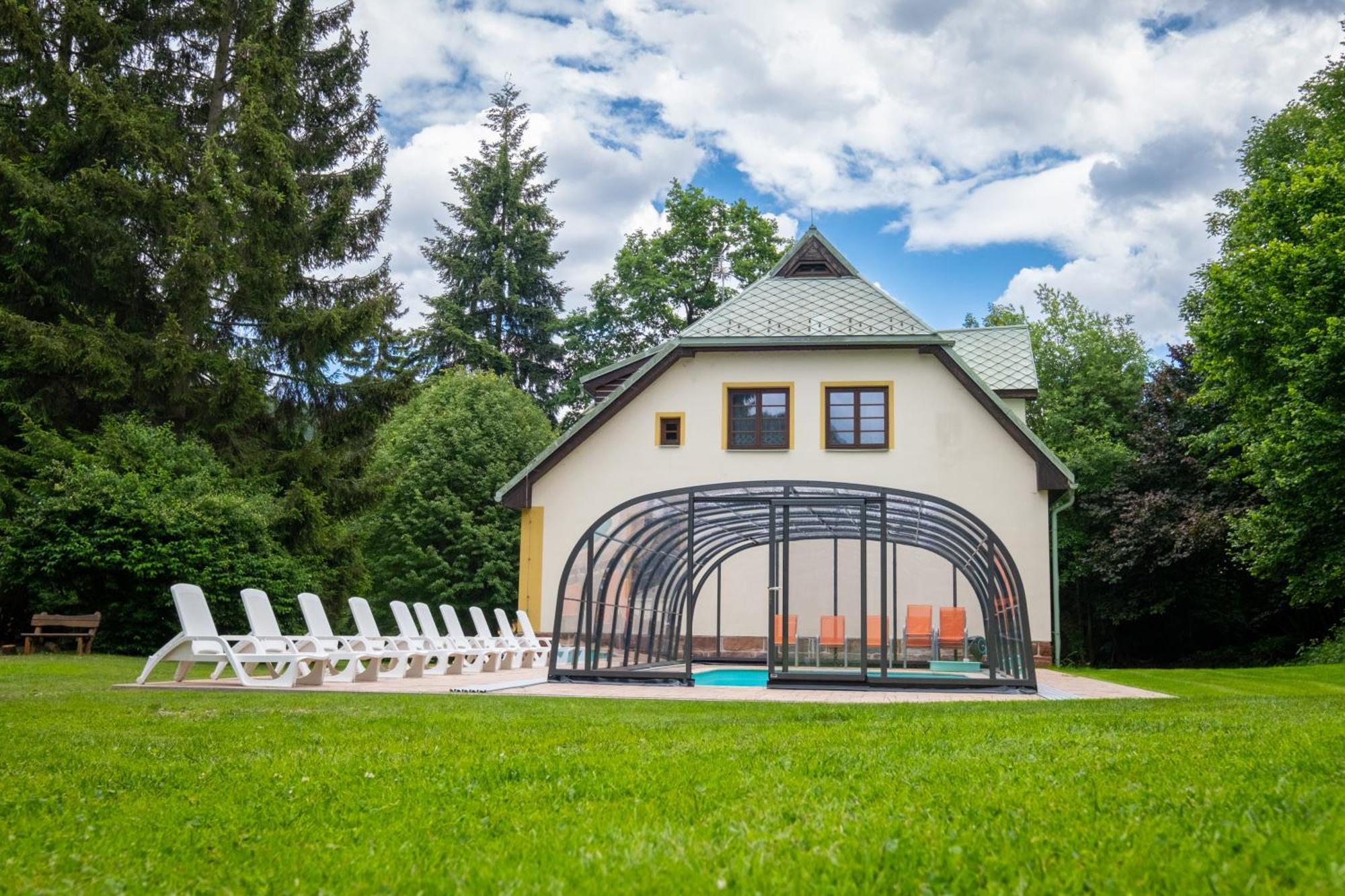 With A Covered Pool, Park, And Playground *