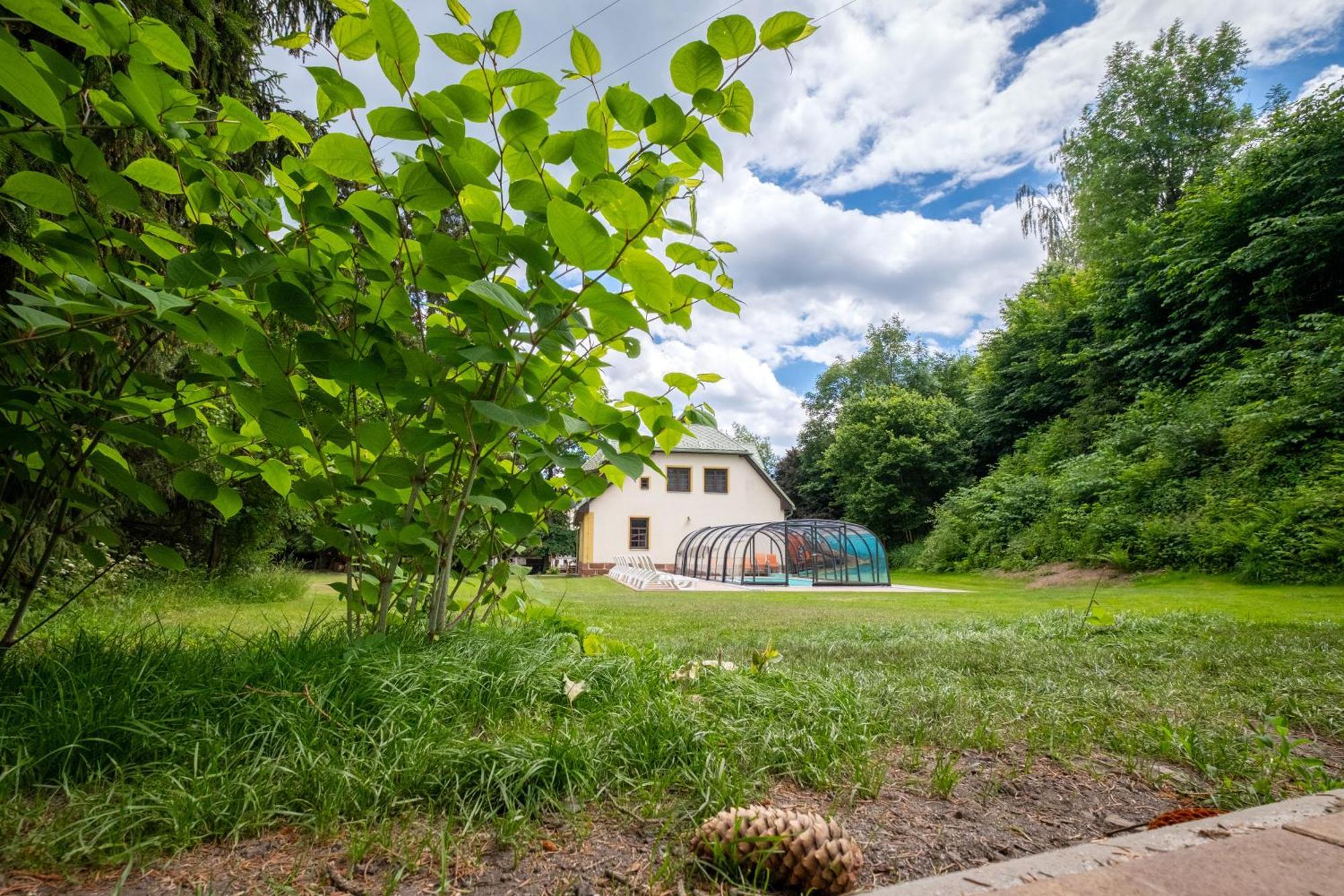 With A Covered Pool, Park, And Playground *