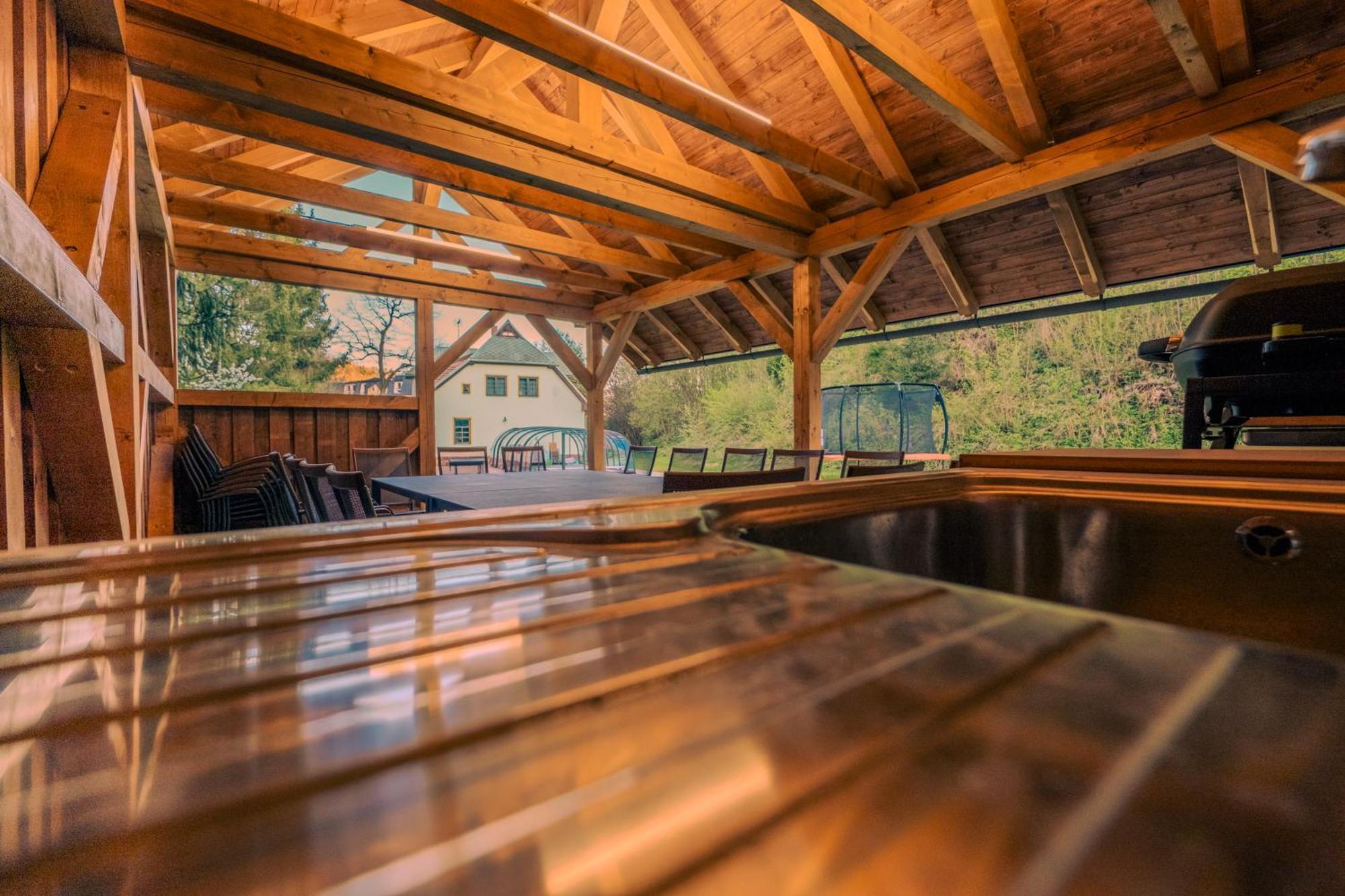 With A Covered Pool, Park, And Playground *