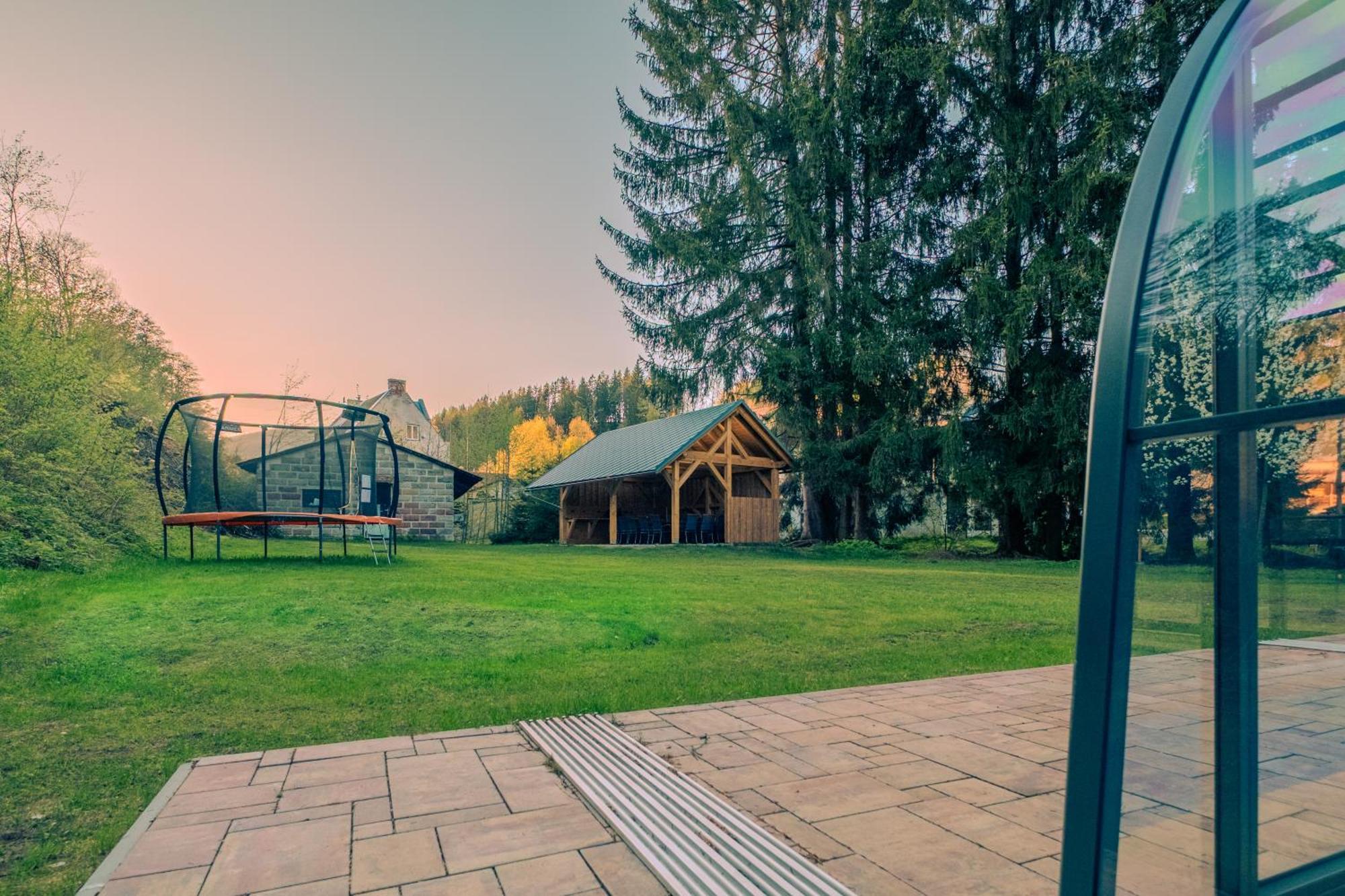 With A Covered Pool, Park, And Playground